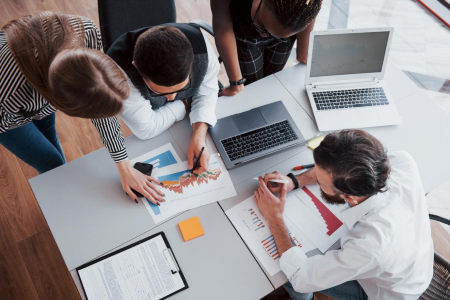 Professional financial planning workspace with charts and analysis tools